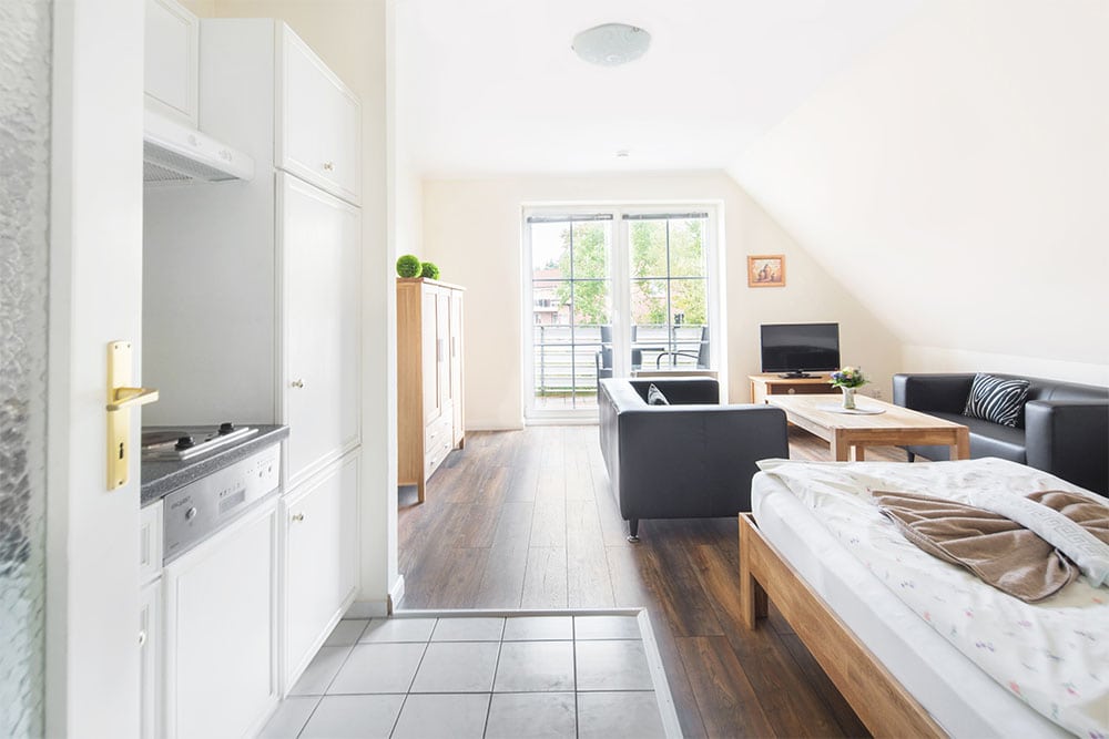 Appartement Vollausstattung Appartement mit Küche, Sitzgelegenheiten und Bett